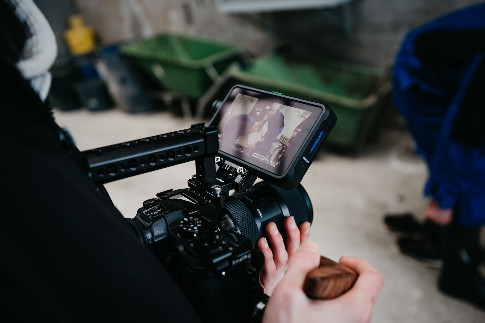 Person holding video camera